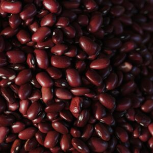 Home Vibrant close-up image of organic red kidney beans, showcasing texture and color.
