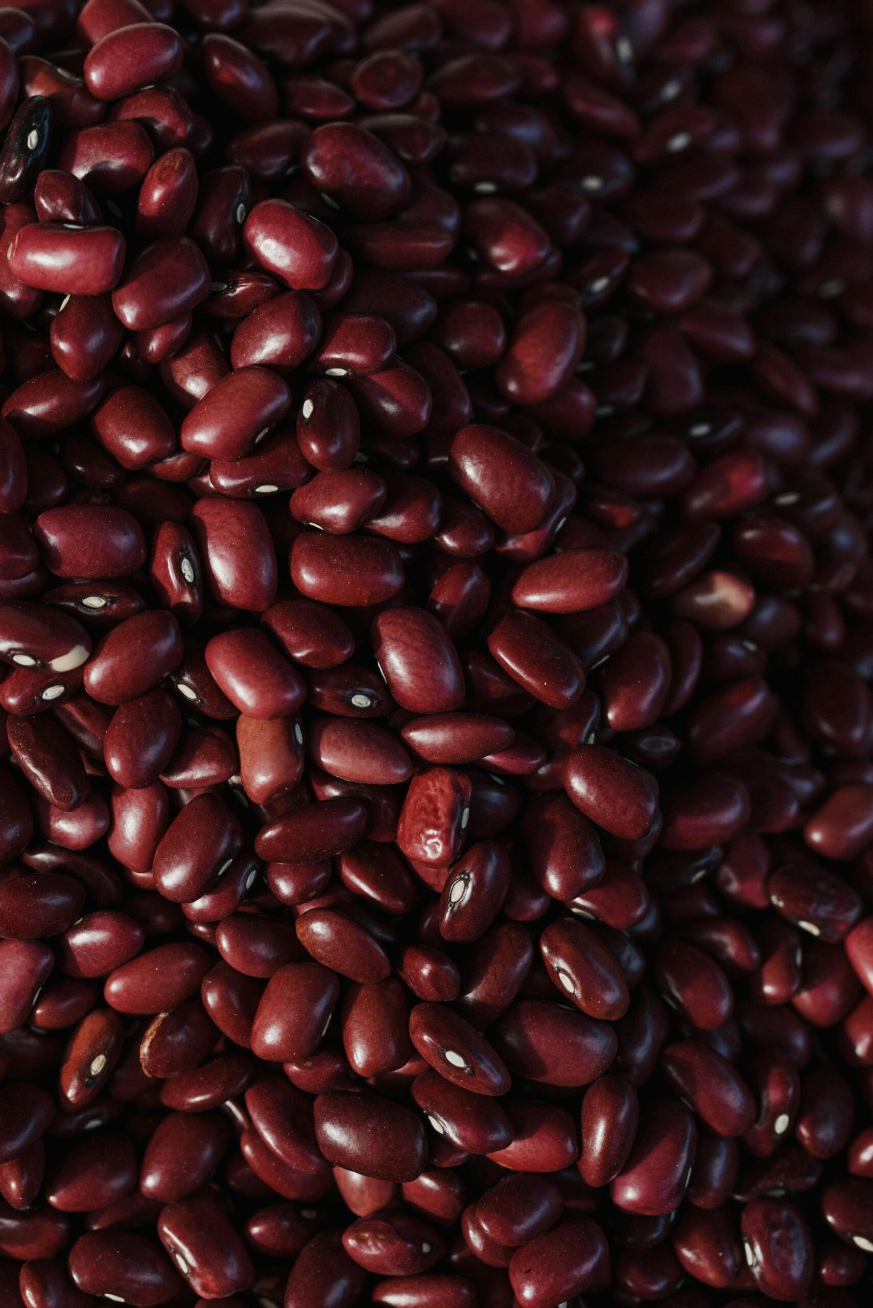 pexels photo 6316671 6316671 Vibrant close-up image of organic red kidney beans, showcasing texture and color.